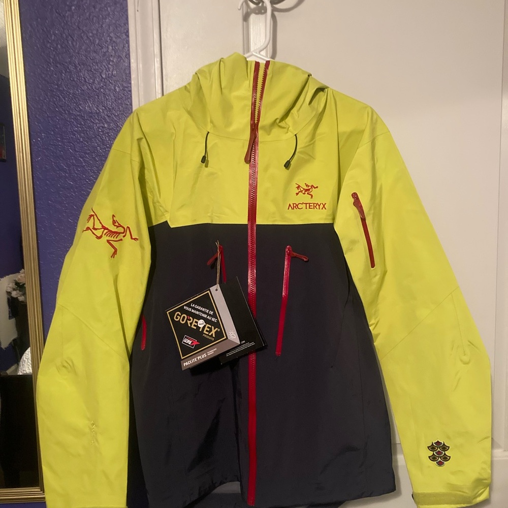 Arcteryx Jacket with red & dark blue accents
